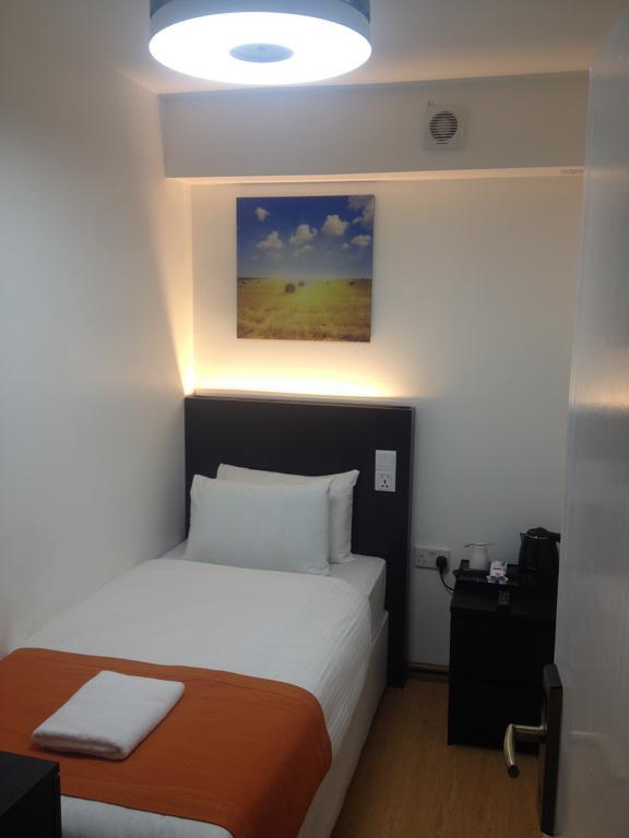 Heathrow Inn Hotel Хитроу Номер фото